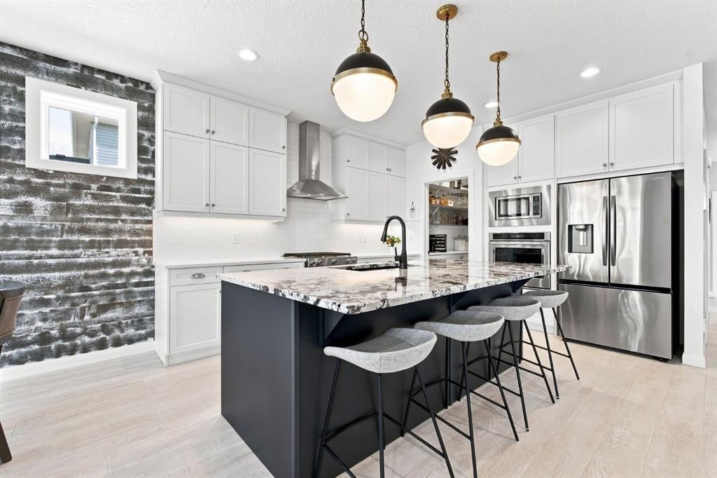 218 Boulder Creek Place, Langdon, AB - Indoor Photo Showing Kitchen With Stainless Steel Kitchen With Upgraded Kitchen