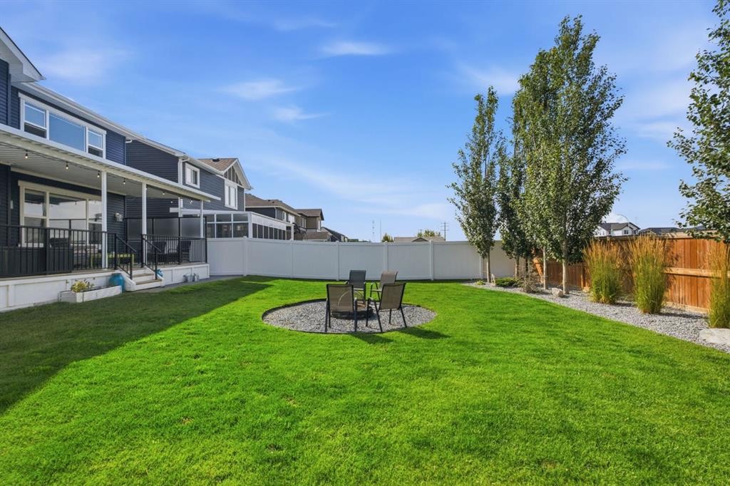 218 Boulder Creek Place, Langdon, AB - Outdoor With Backyard