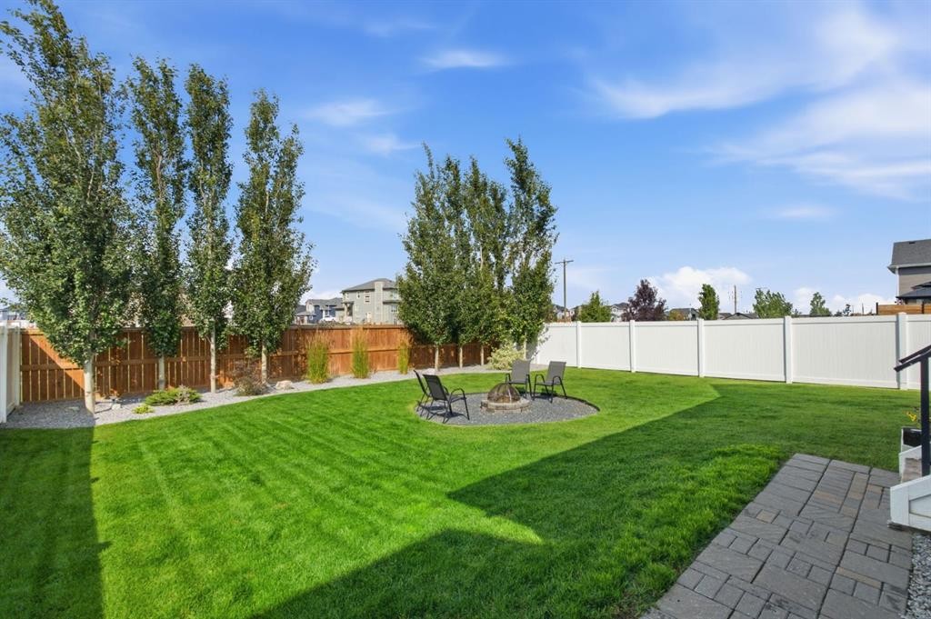 218 Boulder Creek Place, Langdon, AB - Outdoor With Backyard