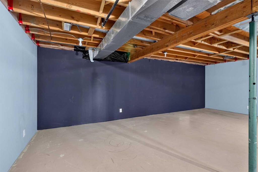 196 Suncrest Way Se, Calgary, AB - Indoor Photo Showing Basement