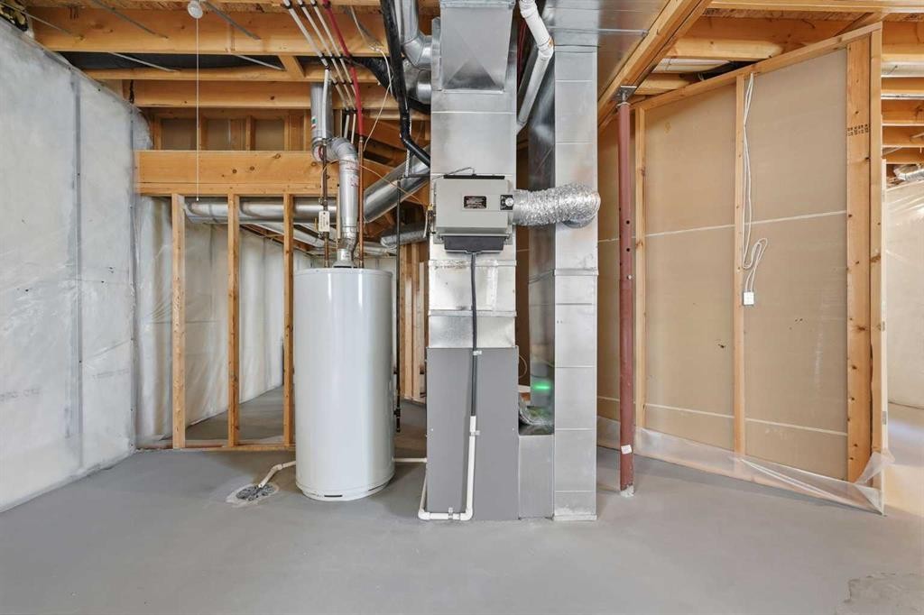 128 Covehaven Gardens Ne, Calgary, AB - Indoor Photo Showing Basement
