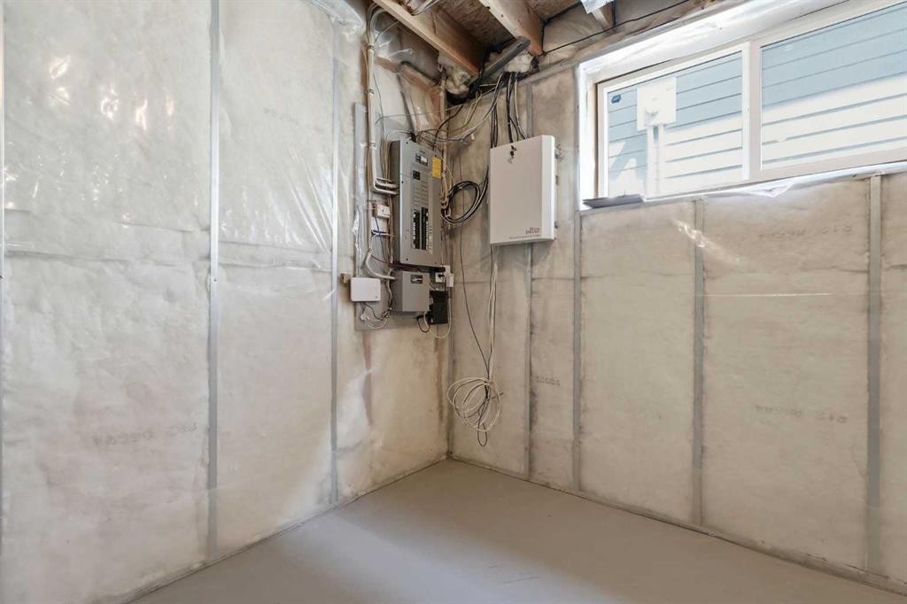 128 Covehaven Gardens Ne, Calgary, AB - Indoor Photo Showing Basement