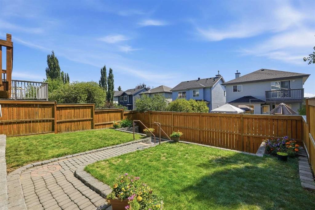 128 Covehaven Gardens Ne, Calgary, AB - Outdoor With Deck Patio Veranda With Backyard