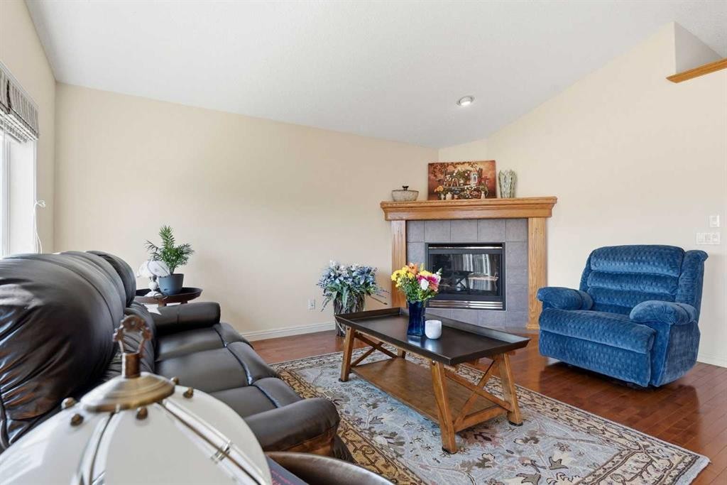 128 Covehaven Gardens Ne, Calgary, AB - Indoor Photo Showing Living Room With Fireplace