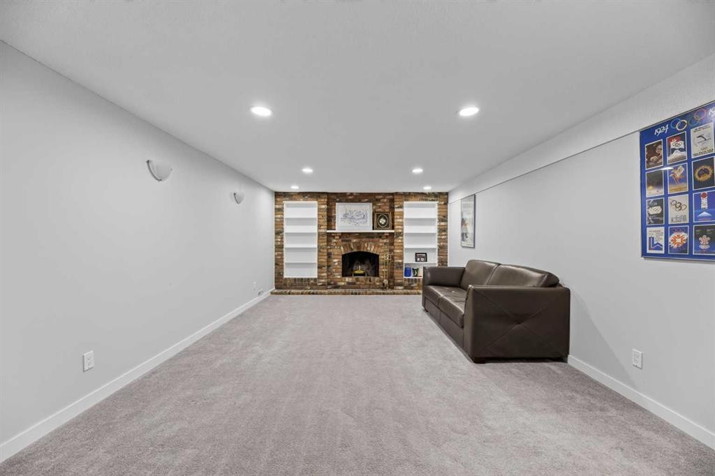 8035 Huntwick Crescent Ne, Calgary, AB - Indoor With Fireplace