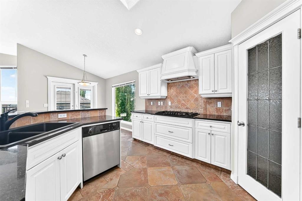 35 Arbour Vista Way Nw, Calgary, AB - Indoor Photo Showing Kitchen With Double Sink