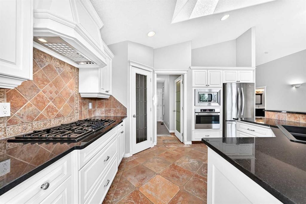 35 Arbour Vista Way Nw, Calgary, AB - Indoor Photo Showing Kitchen With Double Sink With Upgraded Kitchen