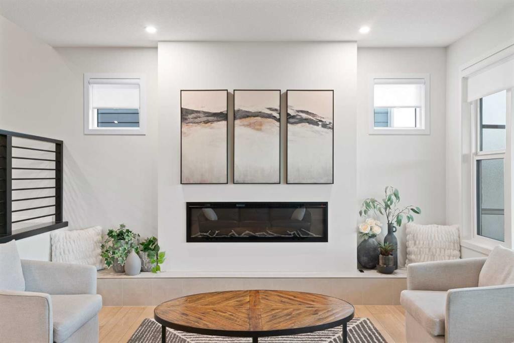 500 Cranbrook Gardens Se, Calgary, AB - Indoor Photo Showing Living Room With Fireplace