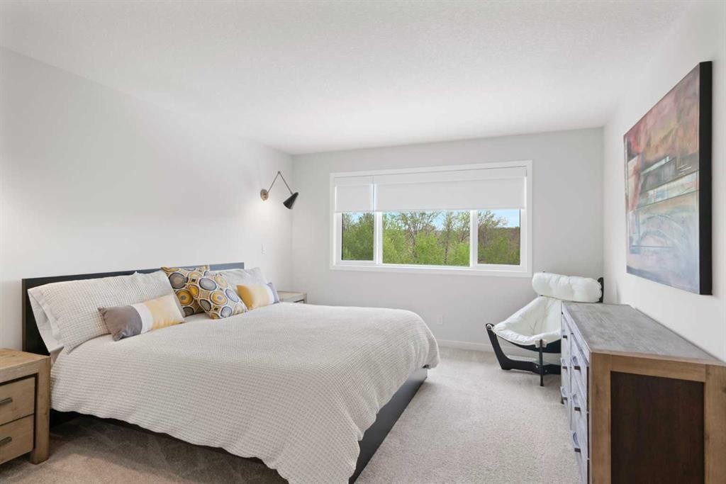 500 Cranbrook Gardens Se, Calgary, AB - Indoor Photo Showing Bedroom