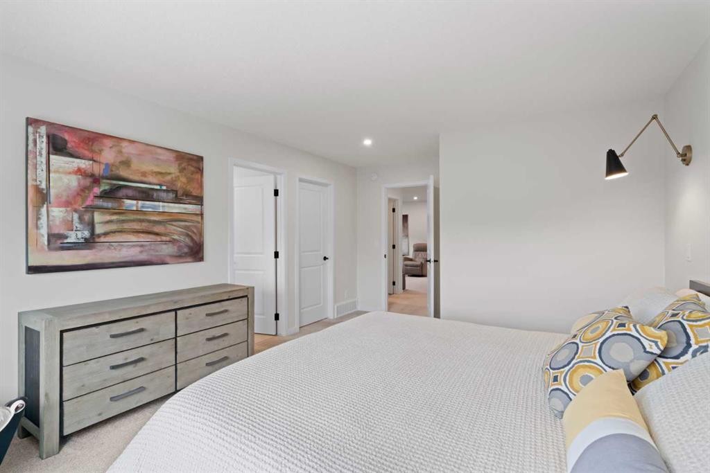 500 Cranbrook Gardens Se, Calgary, AB - Indoor Photo Showing Bedroom
