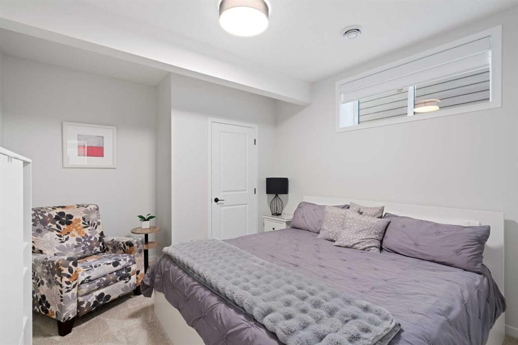 500 Cranbrook Gardens Se, Calgary, AB - Indoor Photo Showing Bedroom