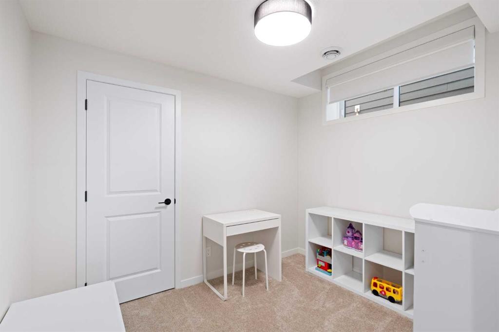 500 Cranbrook Gardens Se, Calgary, AB - Indoor Photo Showing Other Room