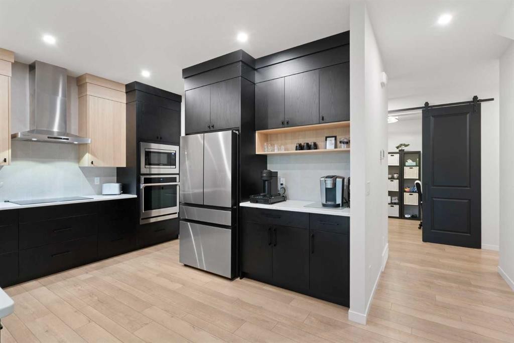 500 Cranbrook Gardens Se, Calgary, AB - Indoor Photo Showing Kitchen With Stainless Steel Kitchen