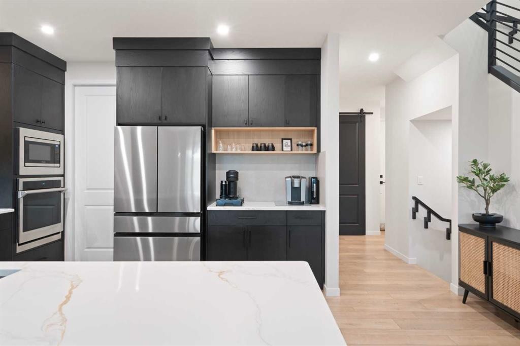 500 Cranbrook Gardens Se, Calgary, AB - Indoor Photo Showing Kitchen With Stainless Steel Kitchen