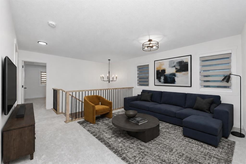 124 Heritage Boulevard, Cochrane, AB - Indoor Photo Showing Living Room