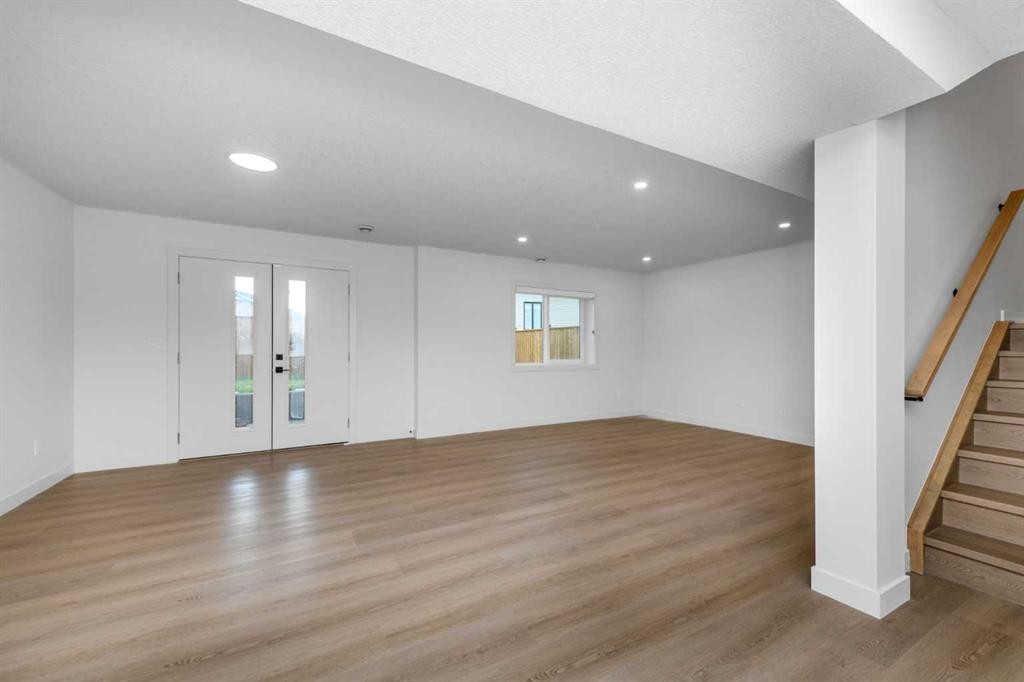 124 Heritage Boulevard, Cochrane, AB - Indoor Photo Showing Other Room