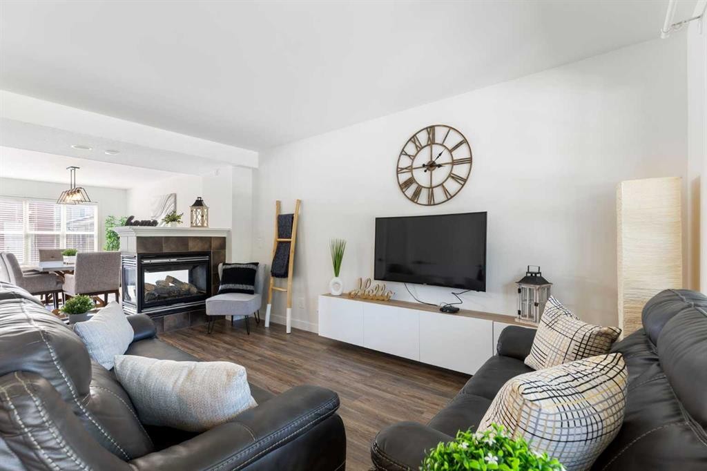 17 Auburn Bay View Se, Calgary, AB - Indoor Photo Showing Living Room With Fireplace