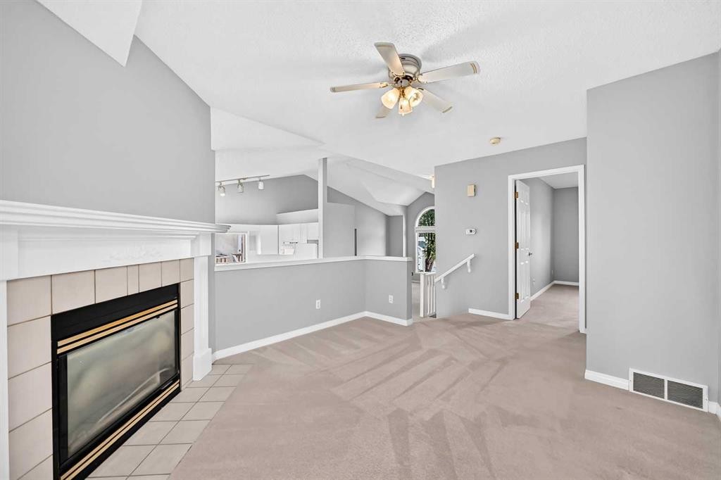 23 Sunlake Gardens Se, Calgary, AB - Indoor With Fireplace