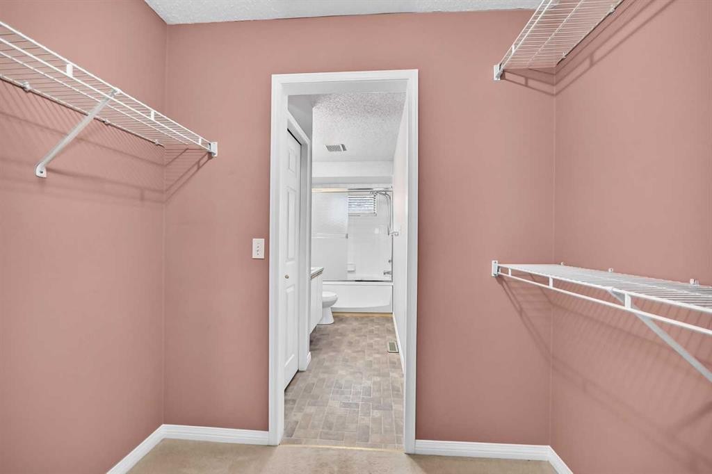 23 Sunlake Gardens Se, Calgary, AB - Indoor With Storage