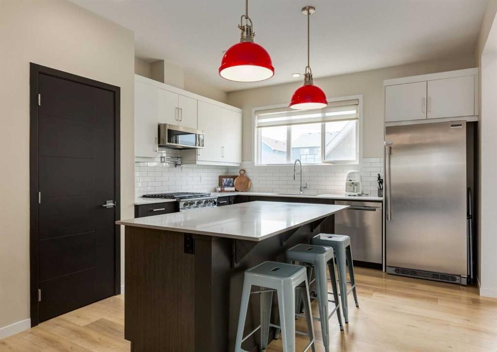 71 Seton Gardens Se, Calgary, AB - Indoor Photo Showing Kitchen With Stainless Steel Kitchen With Upgraded Kitchen