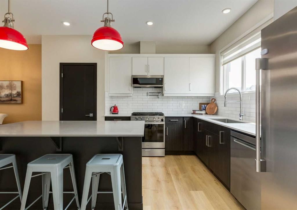 71 Seton Gardens Se, Calgary, AB - Indoor Photo Showing Kitchen With Stainless Steel Kitchen With Upgraded Kitchen