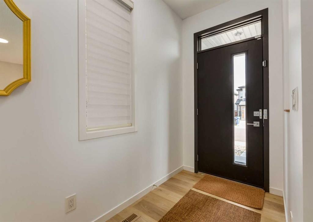 71 Seton Gardens Se, Calgary, AB - Indoor Photo Showing Other Room