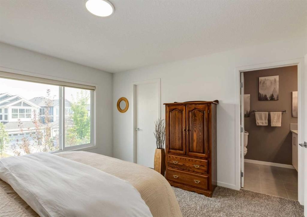 71 Seton Gardens Se, Calgary, AB - Indoor Photo Showing Bedroom