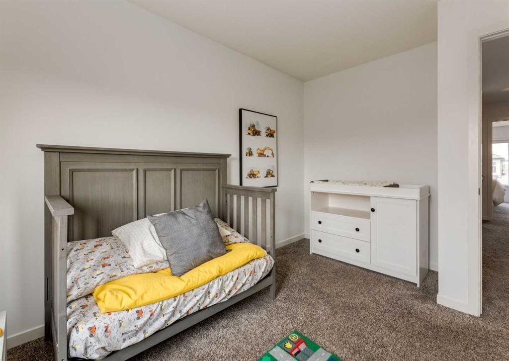 71 Seton Gardens Se, Calgary, AB - Indoor Photo Showing Bedroom