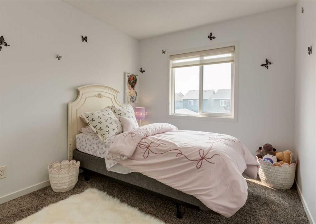 71 Seton Gardens Se, Calgary, AB - Indoor Photo Showing Bedroom