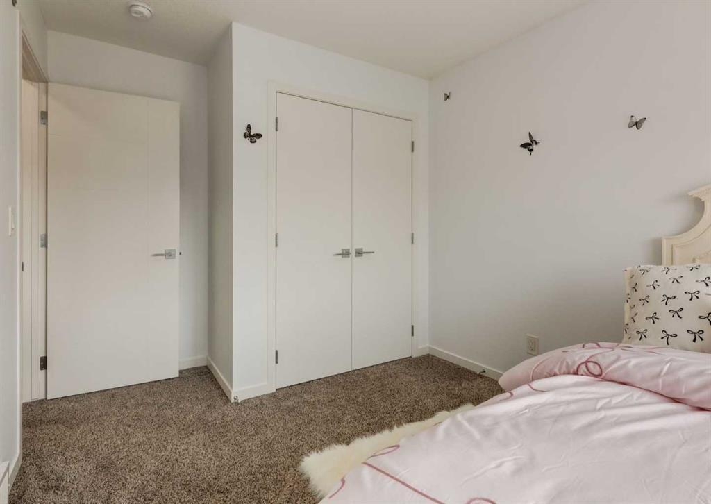 71 Seton Gardens Se, Calgary, AB - Indoor Photo Showing Bedroom