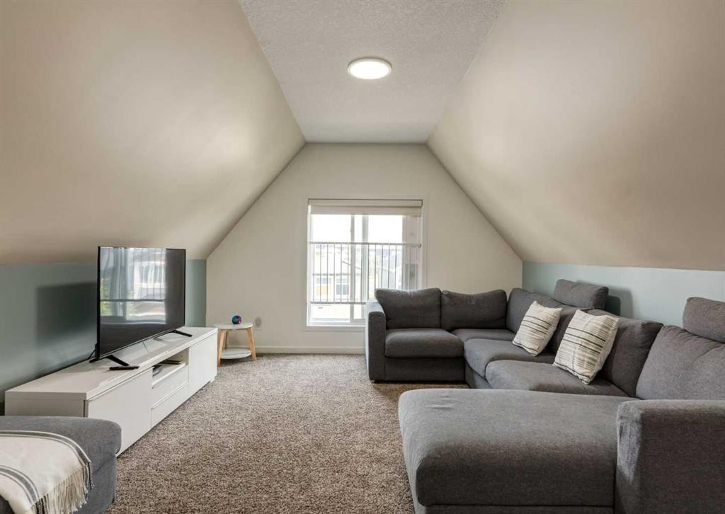 71 Seton Gardens Se, Calgary, AB - Indoor Photo Showing Living Room