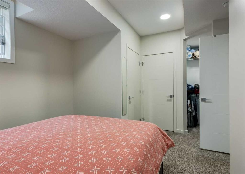 71 Seton Gardens Se, Calgary, AB - Indoor Photo Showing Bedroom