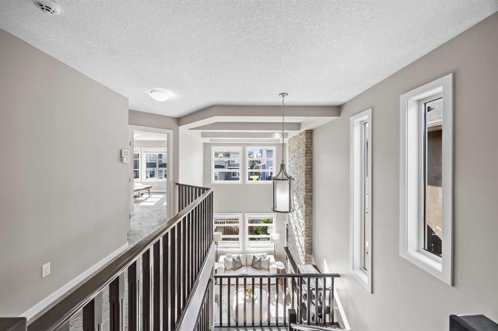 29 Aspen Summit Point Sw, Calgary, AB - Indoor Photo Showing Other Room