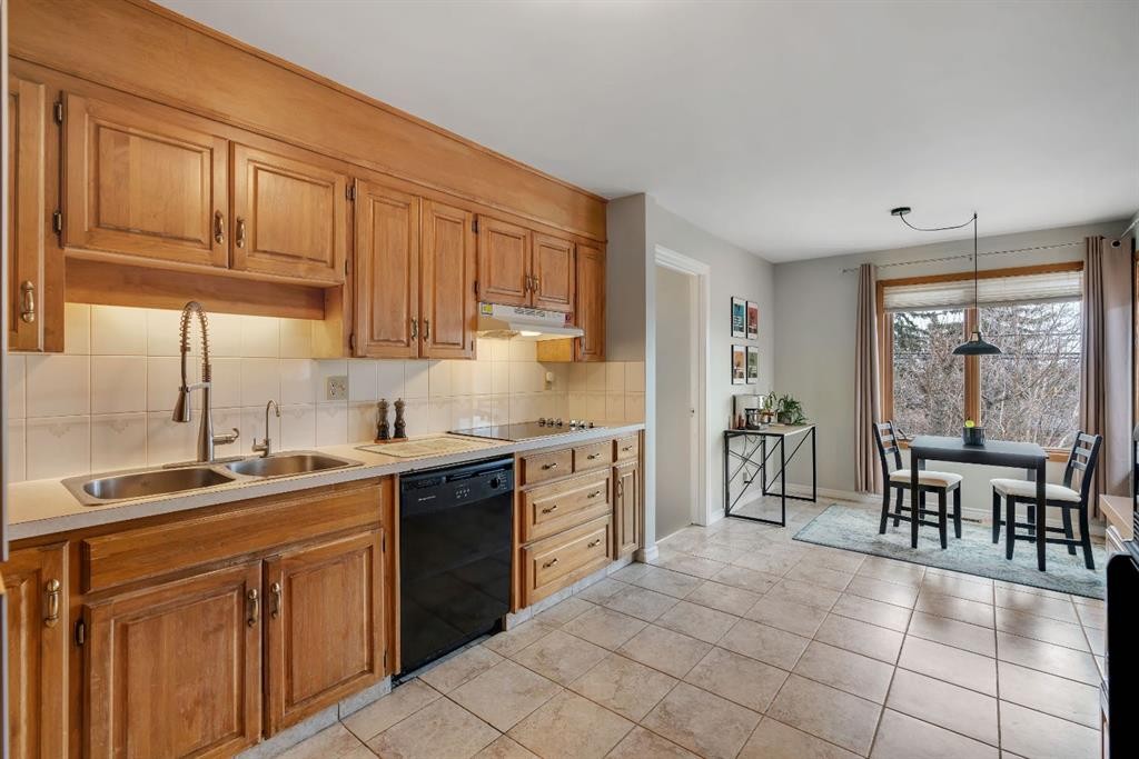 254 Hendon Drive Nw, Calgary, AB - Indoor Photo Showing Kitchen With Double Sink
