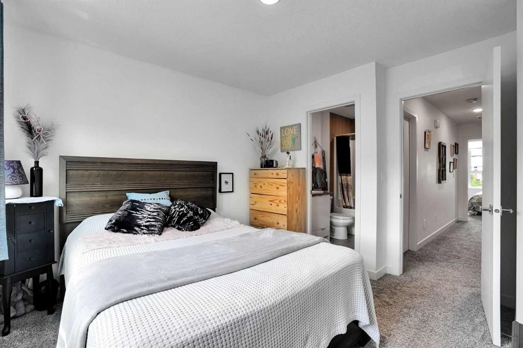 984 Walden Drive Se, Calgary, AB - Indoor Photo Showing Bedroom
