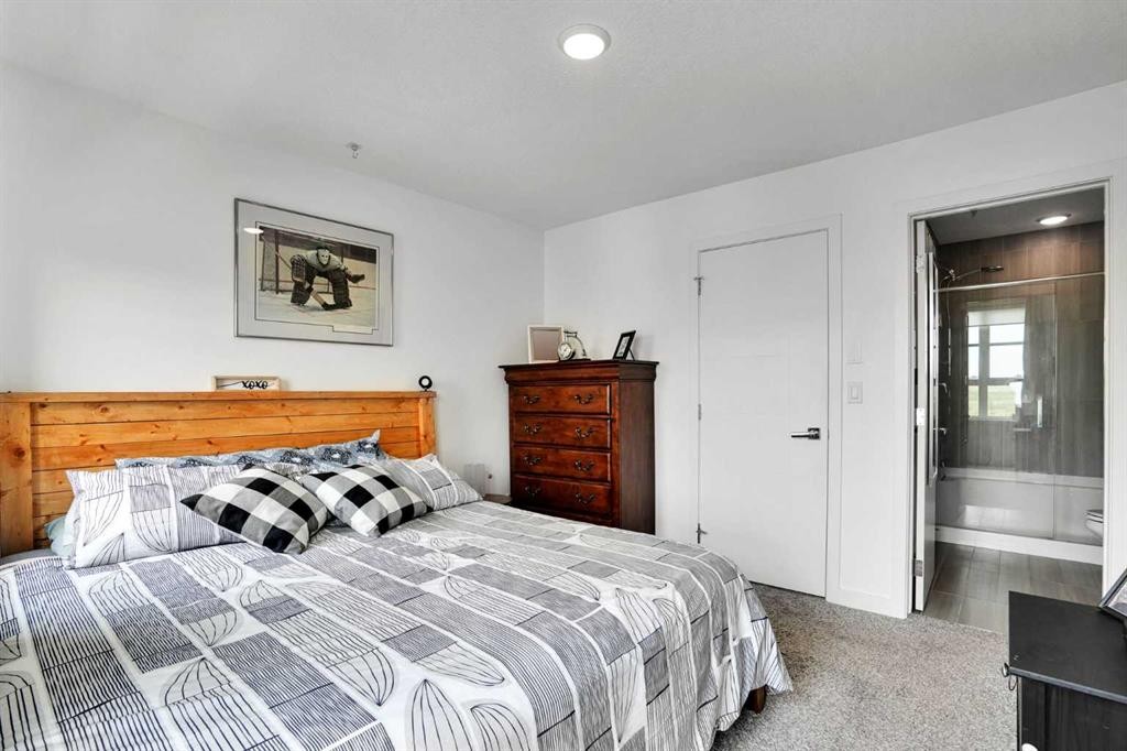 984 Walden Drive Se, Calgary, AB - Indoor Photo Showing Bedroom