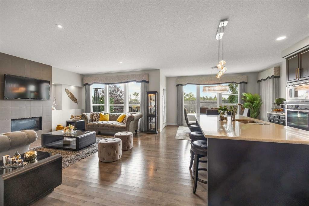 183 Aspen Acres Manor Sw, Calgary, AB - Indoor Photo Showing Living Room With Fireplace