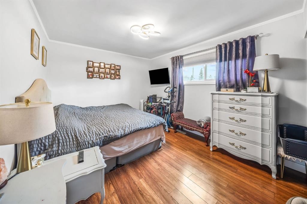 703 Millar Road Ne, Calgary, AB - Indoor Photo Showing Bedroom