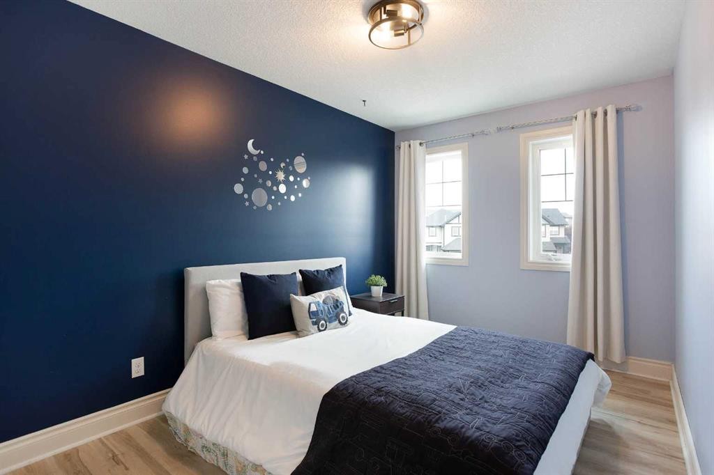 1153 Kingston Crescent Se, Airdrie, AB - Indoor Photo Showing Bedroom