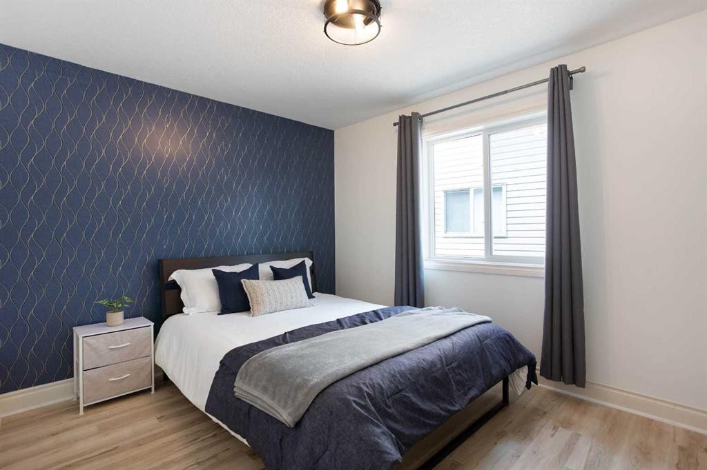 1153 Kingston Crescent Se, Airdrie, AB - Indoor Photo Showing Bedroom