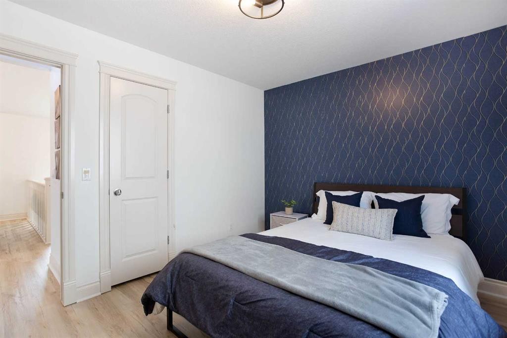 1153 Kingston Crescent Se, Airdrie, AB - Indoor Photo Showing Bedroom