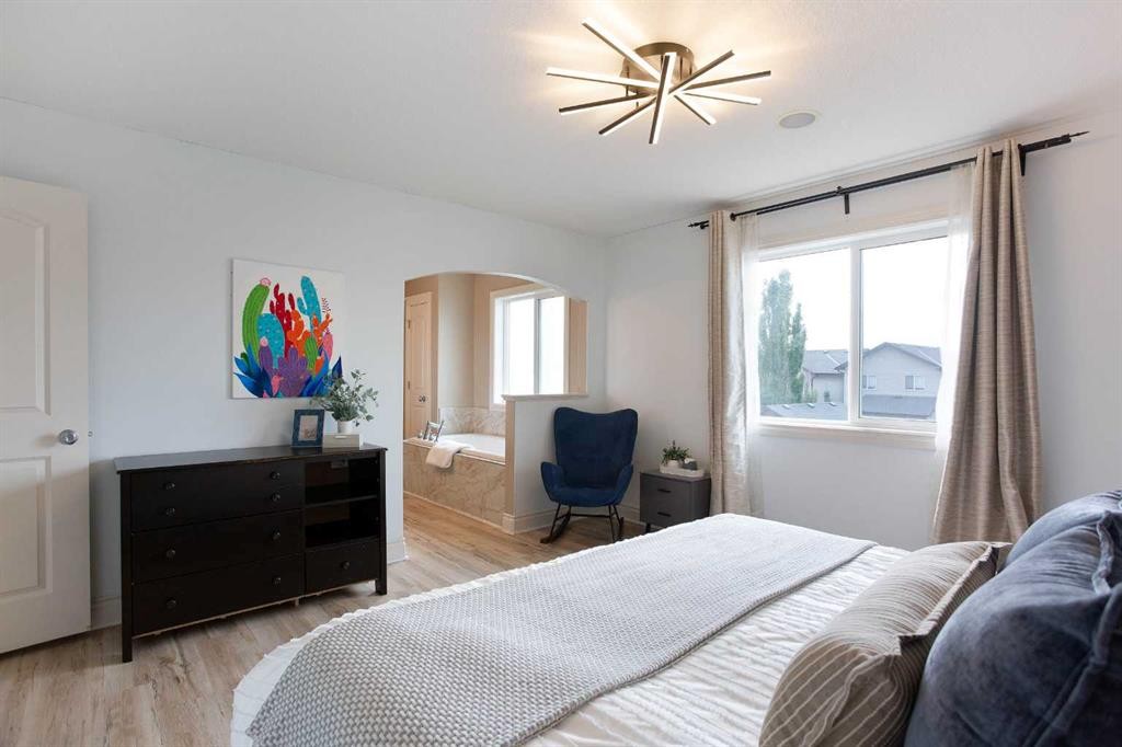 1153 Kingston Crescent Se, Airdrie, AB - Indoor Photo Showing Bedroom