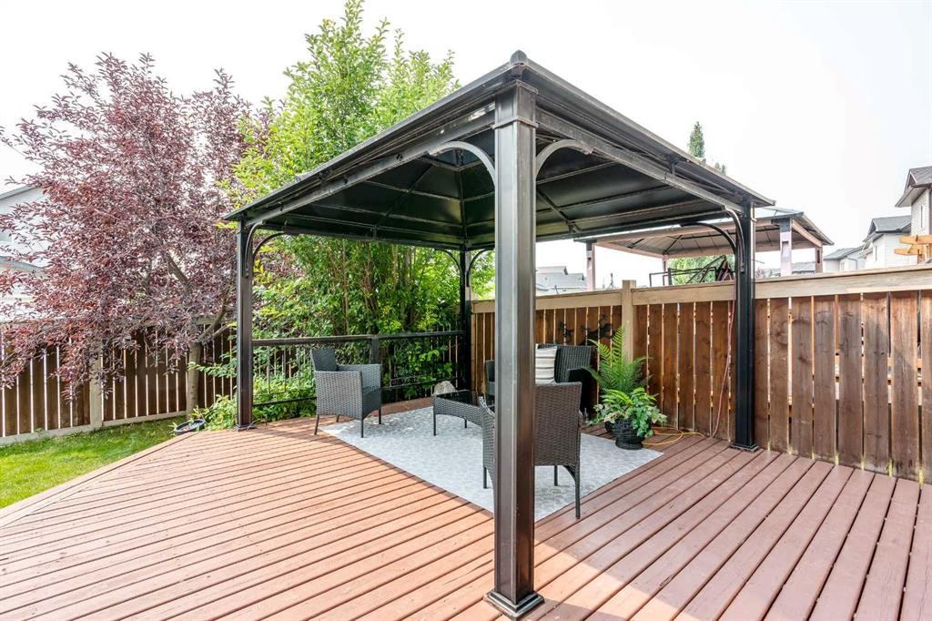 1153 Kingston Crescent Se, Airdrie, AB - Outdoor With Deck Patio Veranda With Exterior