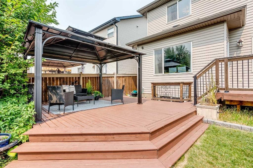 1153 Kingston Crescent Se, Airdrie, AB - Outdoor With Deck Patio Veranda With Exterior