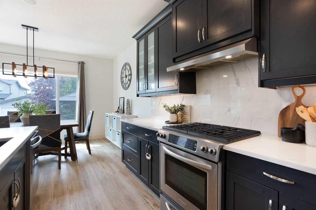 1153 Kingston Crescent Se, Airdrie, AB - Indoor Photo Showing Kitchen With Stainless Steel Kitchen With Upgraded Kitchen