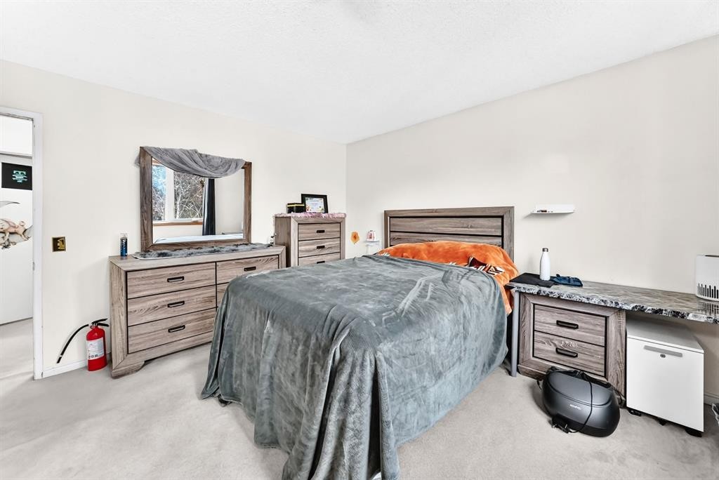 983 Rundlecairn Way Ne, Calgary, AB - Indoor Photo Showing Bedroom