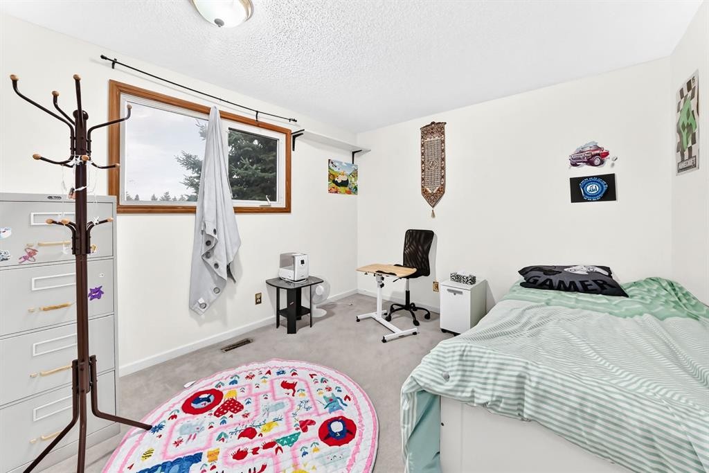 983 Rundlecairn Way Ne, Calgary, AB - Indoor Photo Showing Bedroom