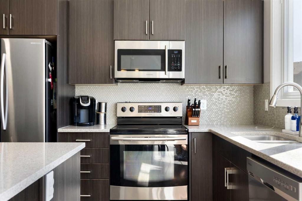 69 Chaparral Valley Crescent Se, Calgary, AB - Indoor Photo Showing Kitchen With Stainless Steel Kitchen With Double Sink With Upgraded Kitchen