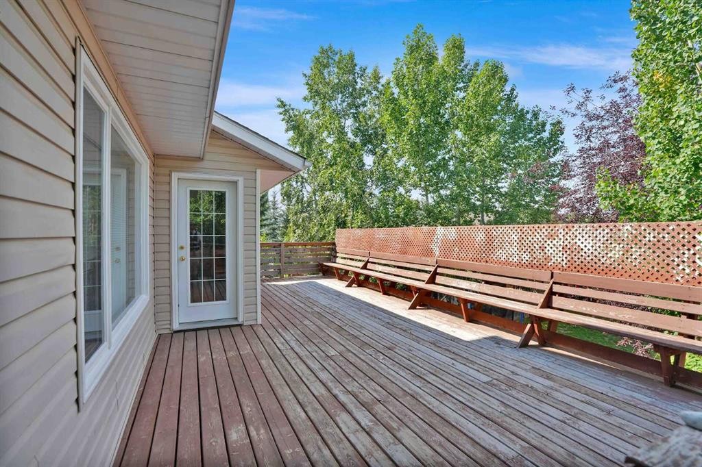 62 West Mitford Crescent, Cochrane, AB - Outdoor With Deck Patio Veranda With Exterior