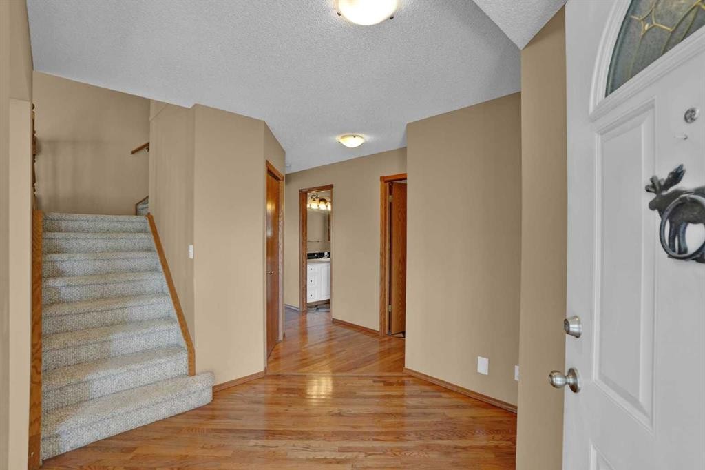 62 West Mitford Crescent, Cochrane, AB - Indoor Photo Showing Other Room